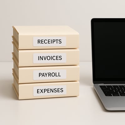 Neatly stacked folders labeled Receipts Invoices Payroll ExpensesLaptop or tablet next to foldersClean minimal backgroundNo clutter or chaos-1